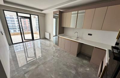 İLKADIMDAN OVACIKTA MERKEZİ LOKASYONDA İSKANLI KATTA 4+1