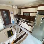 4+1 220M2 ARA KAT EBEVEYN BANYO ÇİFT ASANSÖRLÜ TERAS BALKON MERKEZİ PAY ÖLÇER SİTE İÇİ PEYZAJ ALANI SİTE İÇİ ÇOCUK OYUN ALANI AÇIK VE KAPALI OTOPARK 7/24 GÜVENLİK KAMERA SİSTEMLİ